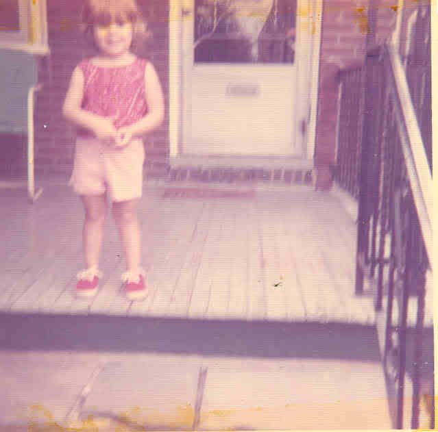 Trish at age 5 on Nana's porch