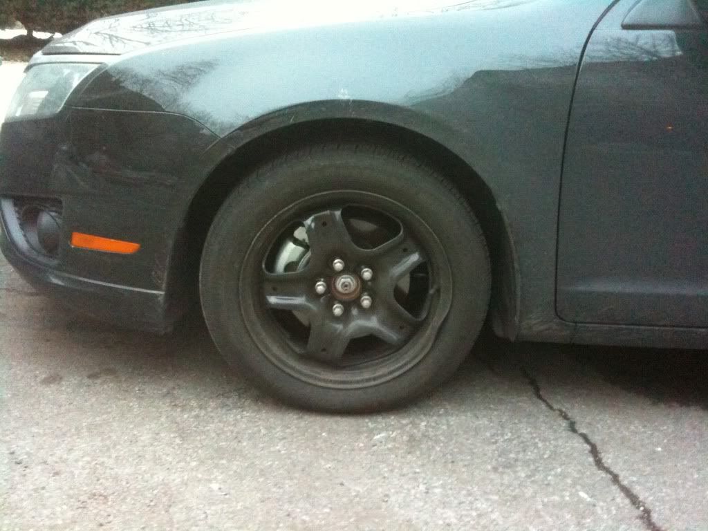 Removing wheel covers to show black steel '10 SE