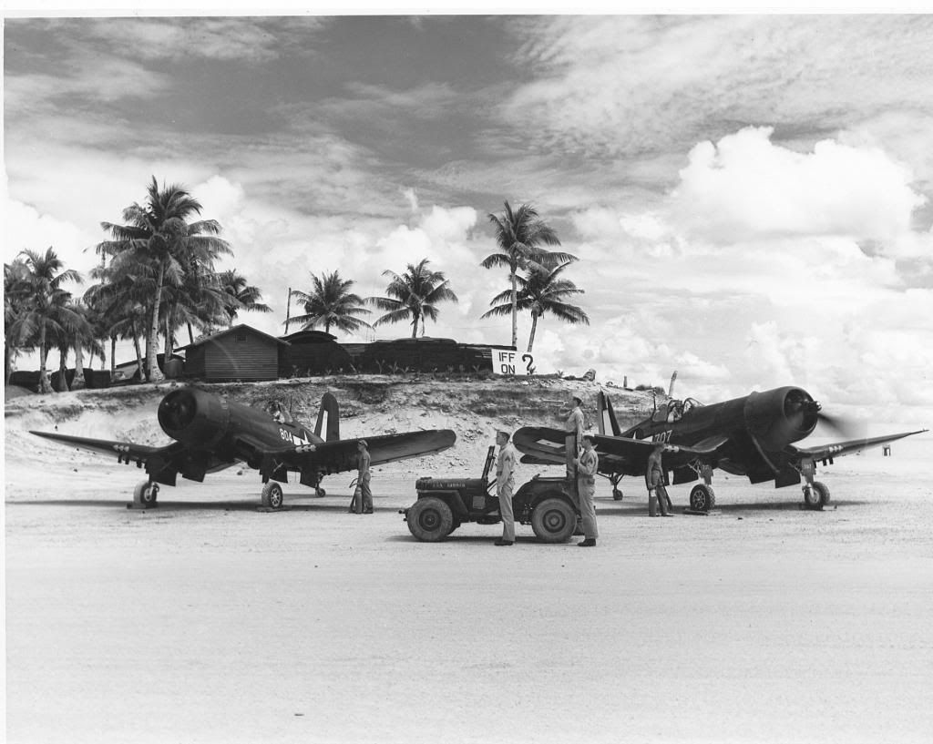 Two F4U Corsair aircraft of VMF-122ready for take off 1945