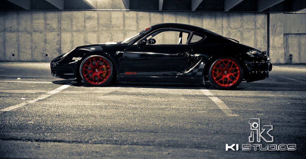 black-cayman-red-wheels.jpg